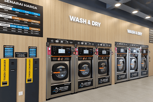 OASIS commercial stack washer dryer installed in an apartment laundry room